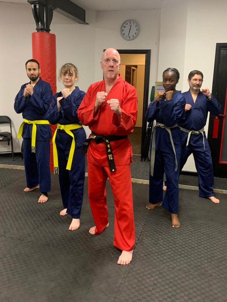 Tae-Kwon-Do students in pose Wakefield Tae-Kwon-Do